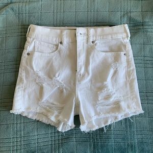 White distressed denim shorts